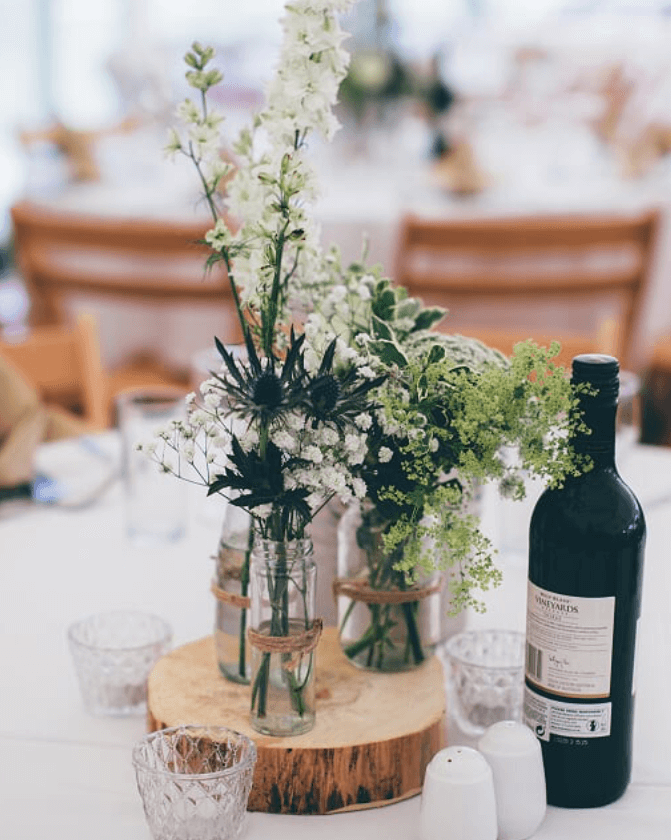 White and green wedding table centrepiece